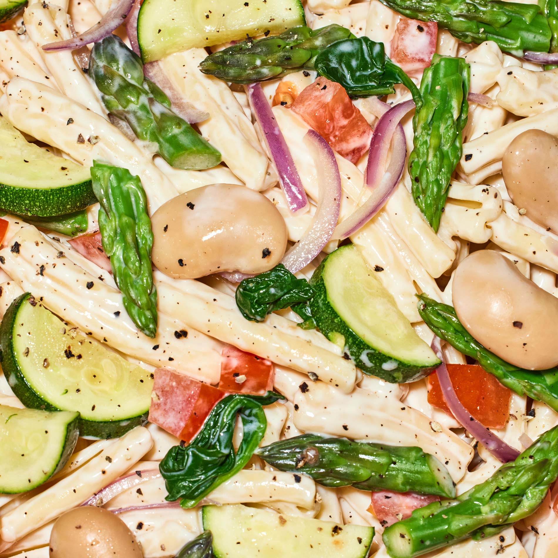 4. A close-up shot of the Zucchini + Gigante Bean Primavera Pesto Pasta prepared.